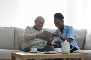 home nurse and man on couch